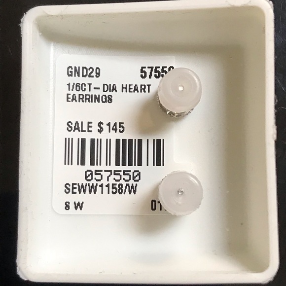 1/6 ctw Diamond
Heart Earrings - Picture 2 of 2